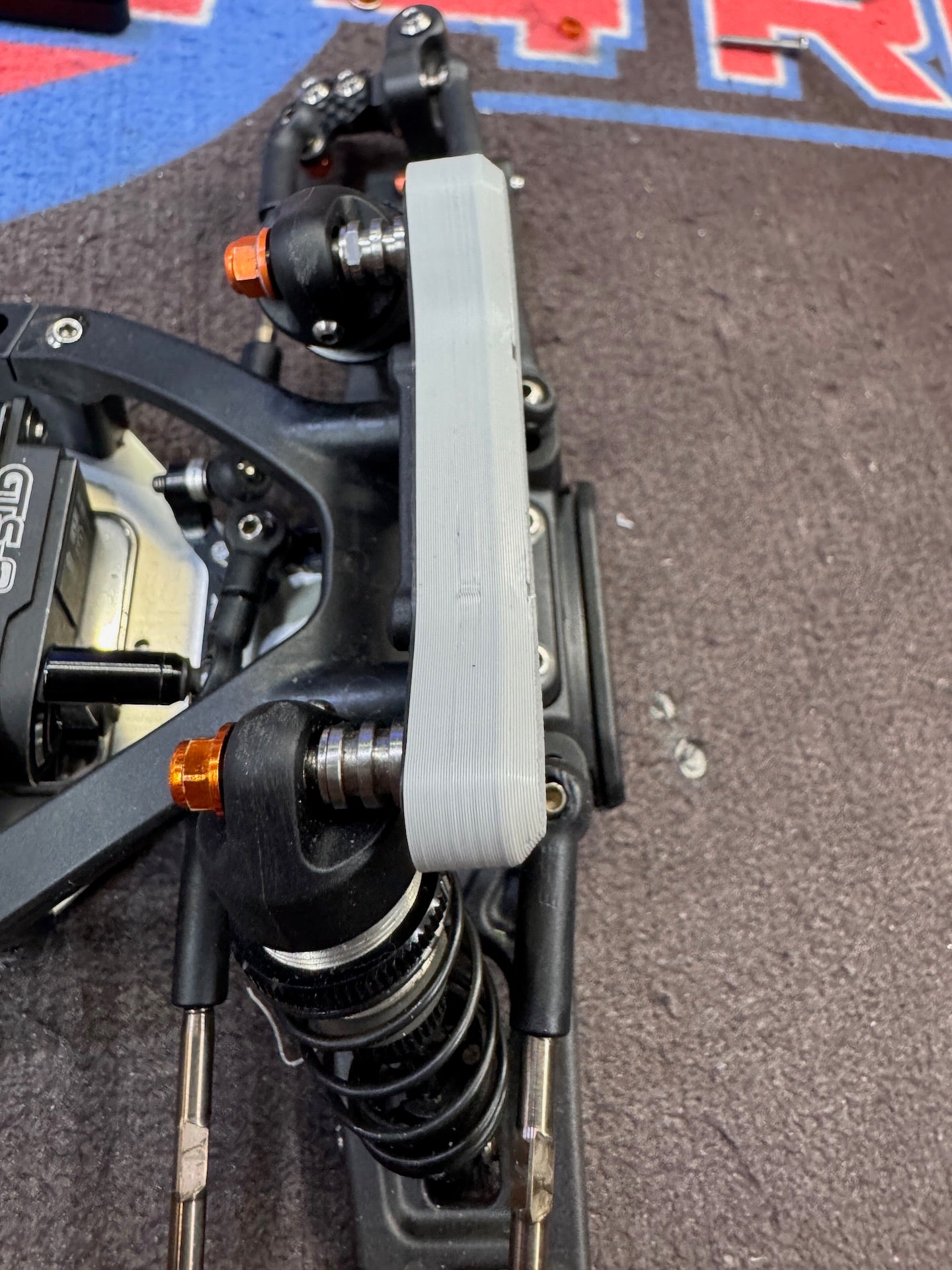 Xray XB2 2025-26 front shock tower protector for quick tune mounts