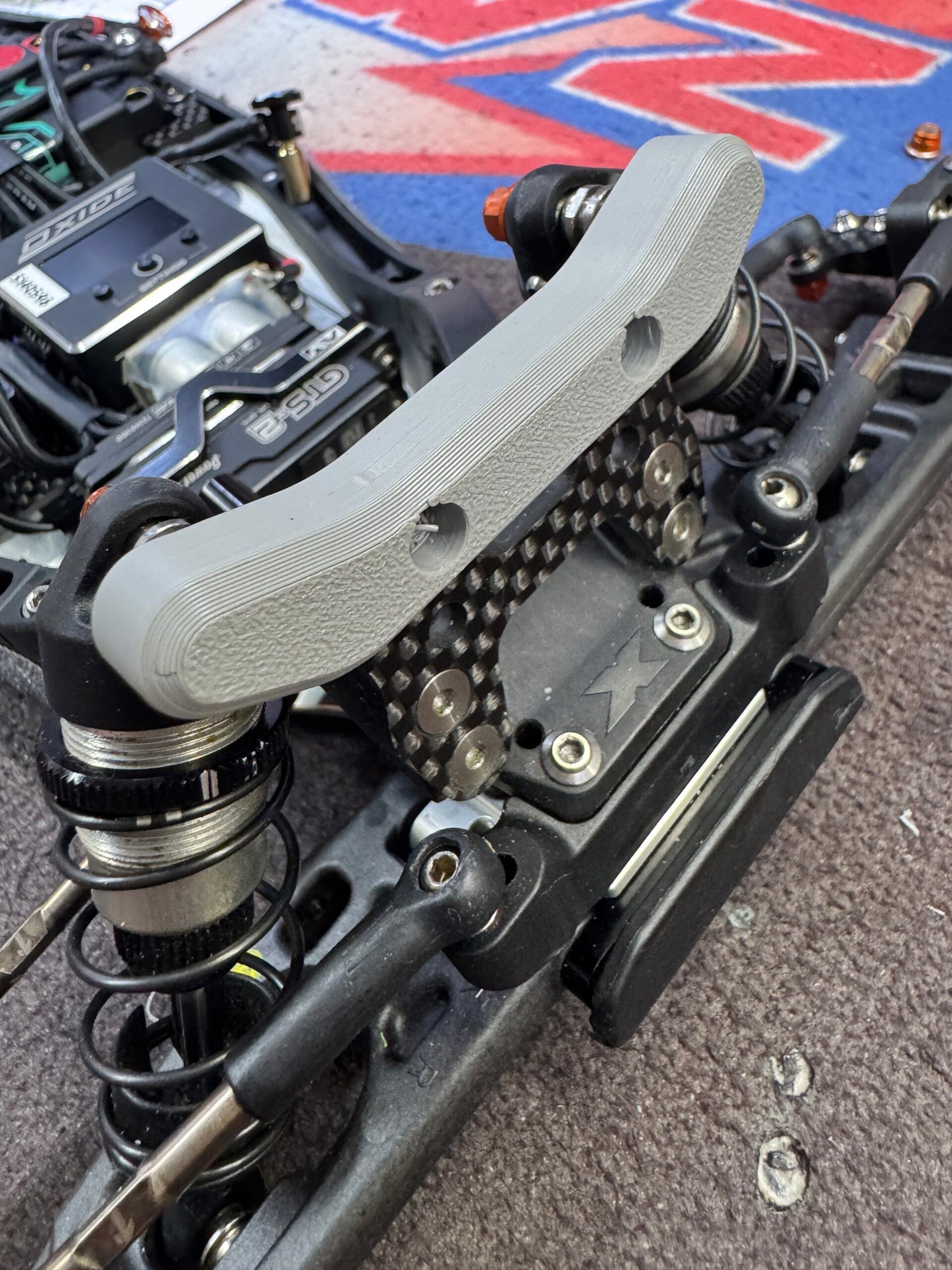 Xray XB2 2025-26 front shock tower protector for quick tune mounts